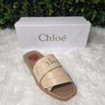 Nude embroidered slides
