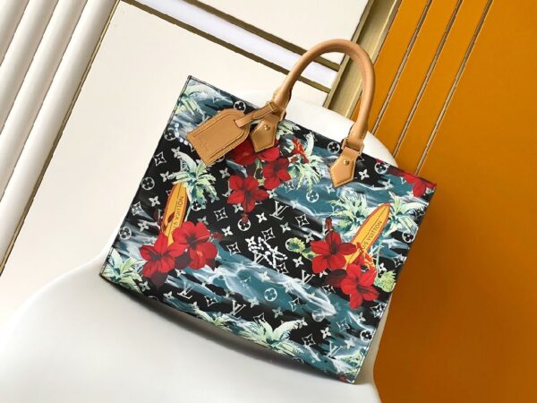 Hibiscus print leather bag