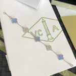 Baby blue and silver cleef